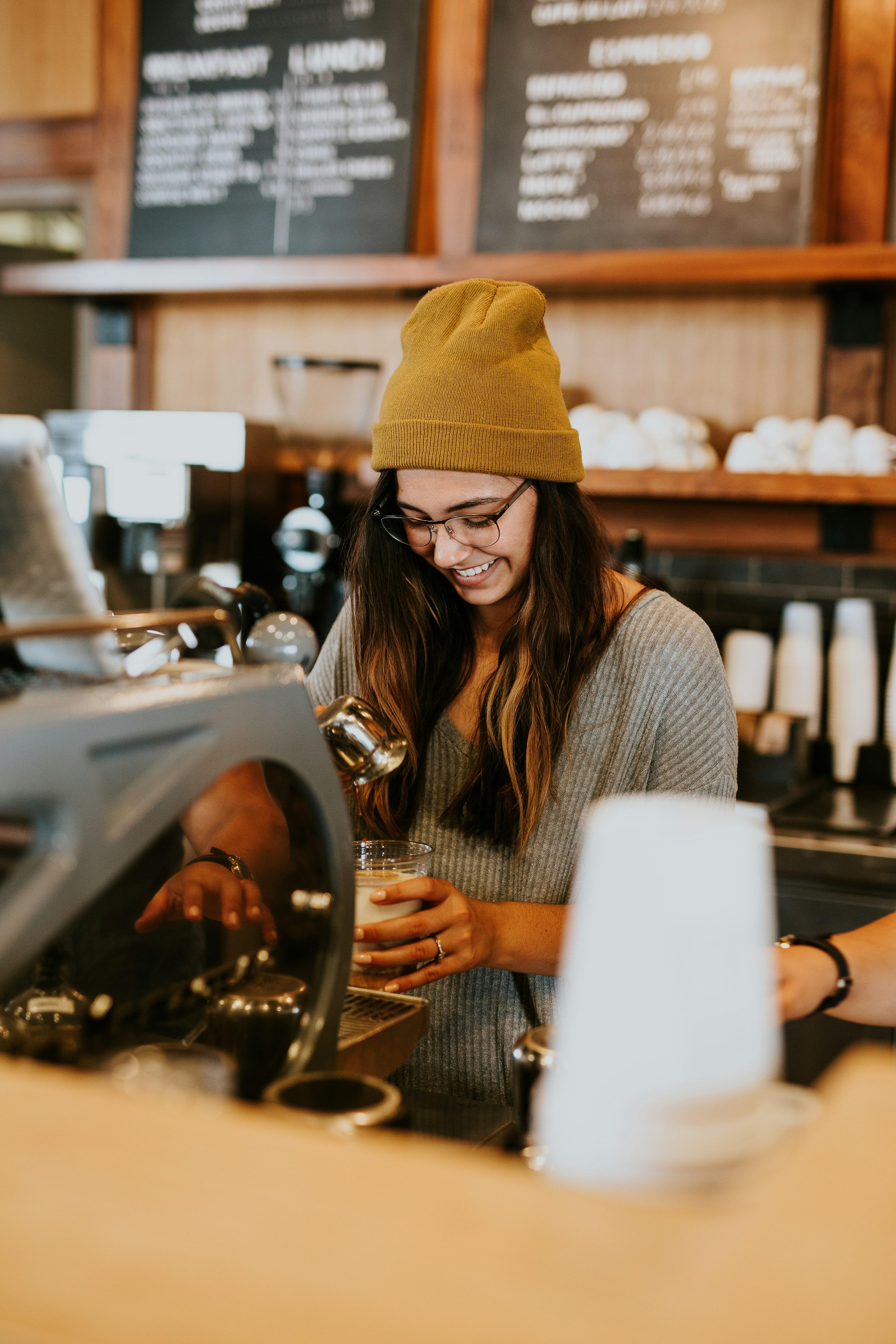 Creators collaborating over coffee at The Studio Café