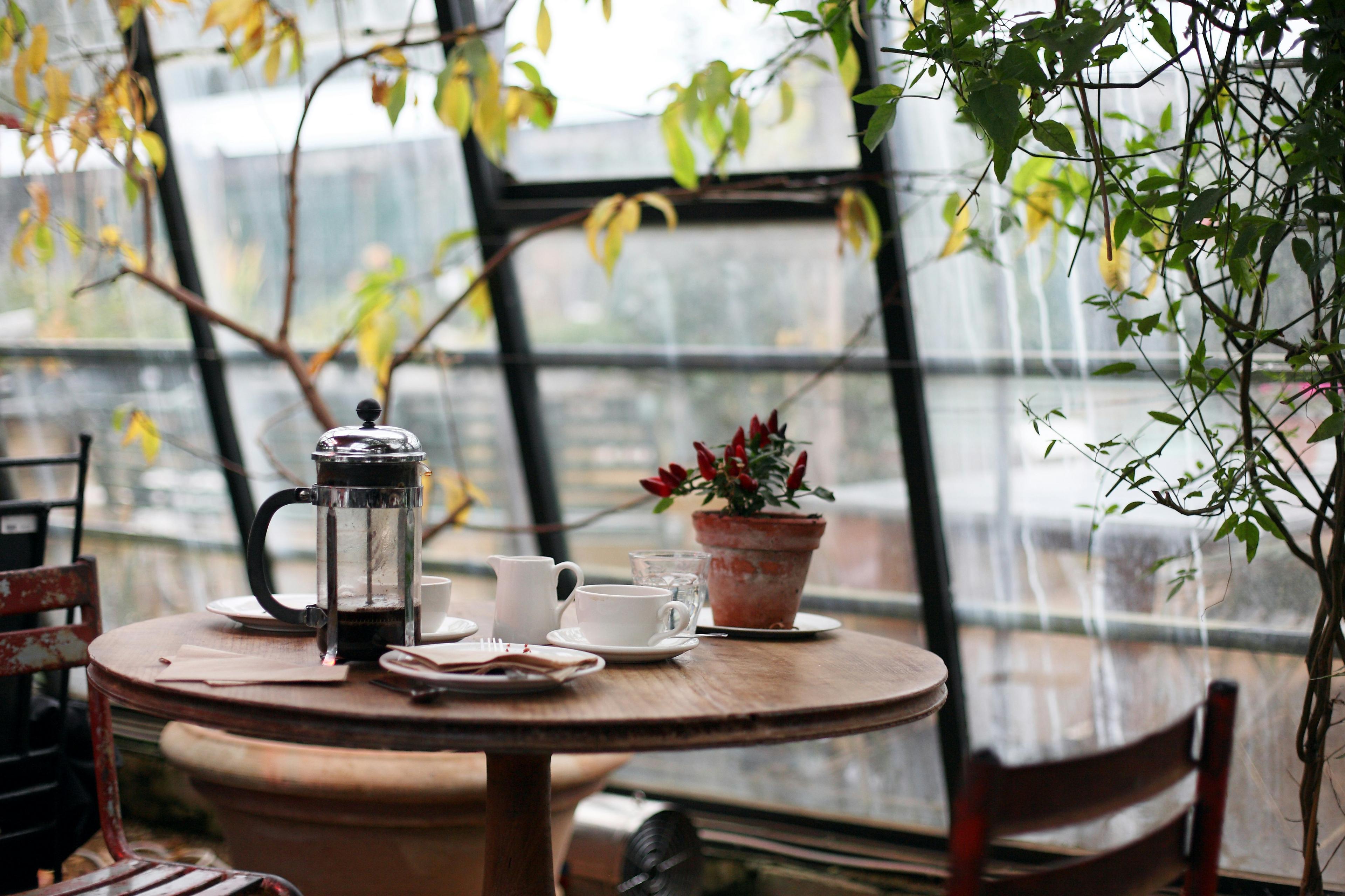 Beautiful editorial café interior with tables and minimalist design